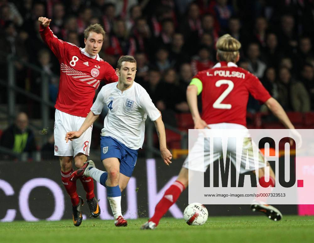 Denmarks Christian Eriksen (L) tussles with Englands Jack Wilshere International Friendly Denmark v England 9th February, 2011 .