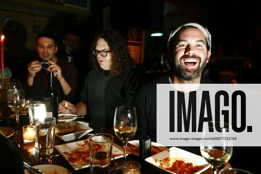 Jan 07, 2009 - New York, New York, USA - Singer DUNCAN SHEIK (R) and friends having dinner at Il Posto in the East Village, behind him with the glasses is MICHAEL TUDOR. - ZUMAa29_