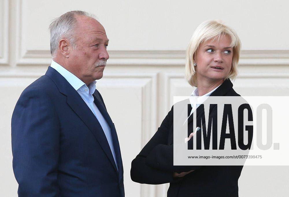 CSKA s deputy head, Olympic gymnastics champion Svetlana Khorkina (R) with husband Oleg Kochnov outside Moscow s Bolshoi Theatre where a production of Giuseppe Verdi s opera Simon Boccanegra is to be presented by the Teatro alla Scala (Milan s grand opera house) as part of the 2016 Chereshnevy Les Open Art Festival. Artyom Korotayev TASS TS031133