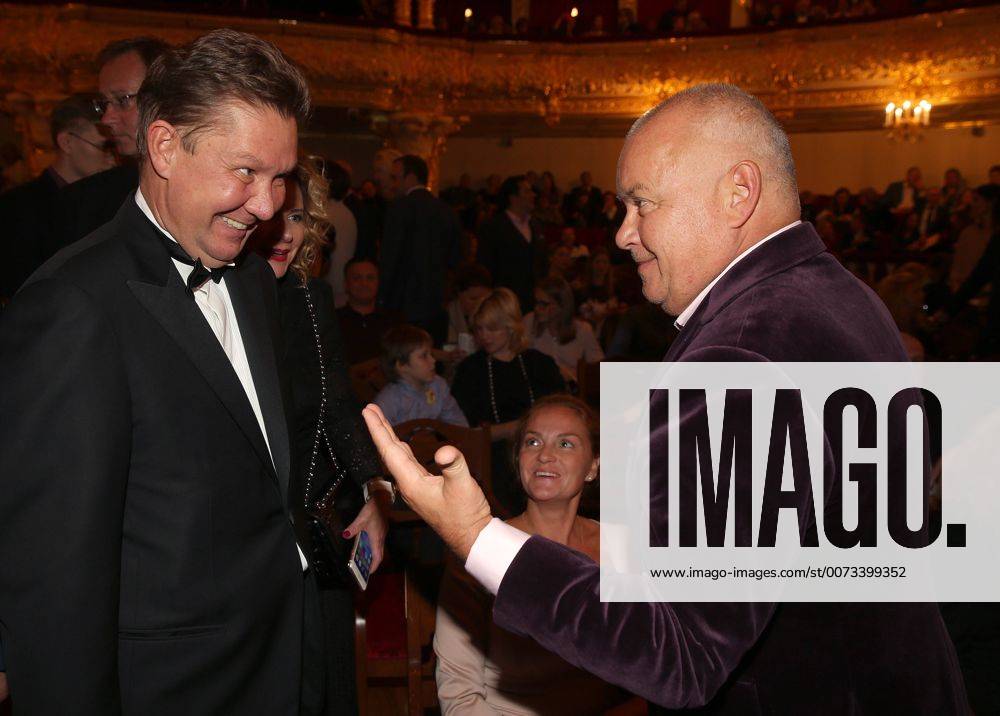 Chairman of the board of directors at Gazprom, Alexei Miller (L) and journalist Dmitry Kiselev shake hands at Moscow s Bolshoi Theatre before a production of Giuseppe Verdi s opera Simon Boccanegra presented by the Teatro alla Scala (Milan s grand opera house) as part of the 2016 Chereshnevy Les Open Art Festival. Artyom Korotayev TASS TS03114C
