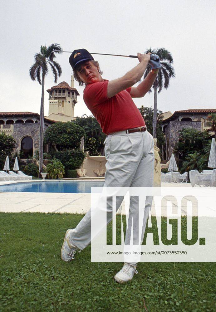 Nov 1, 1992 - Palm Beach, Florida, U.S. - EXCLUSIVE - DONALD TRUMP hits some golf balls on the west lawn of Mar-a-lago in Palm Beach. Palm Beach U.S. - ZUMAd135