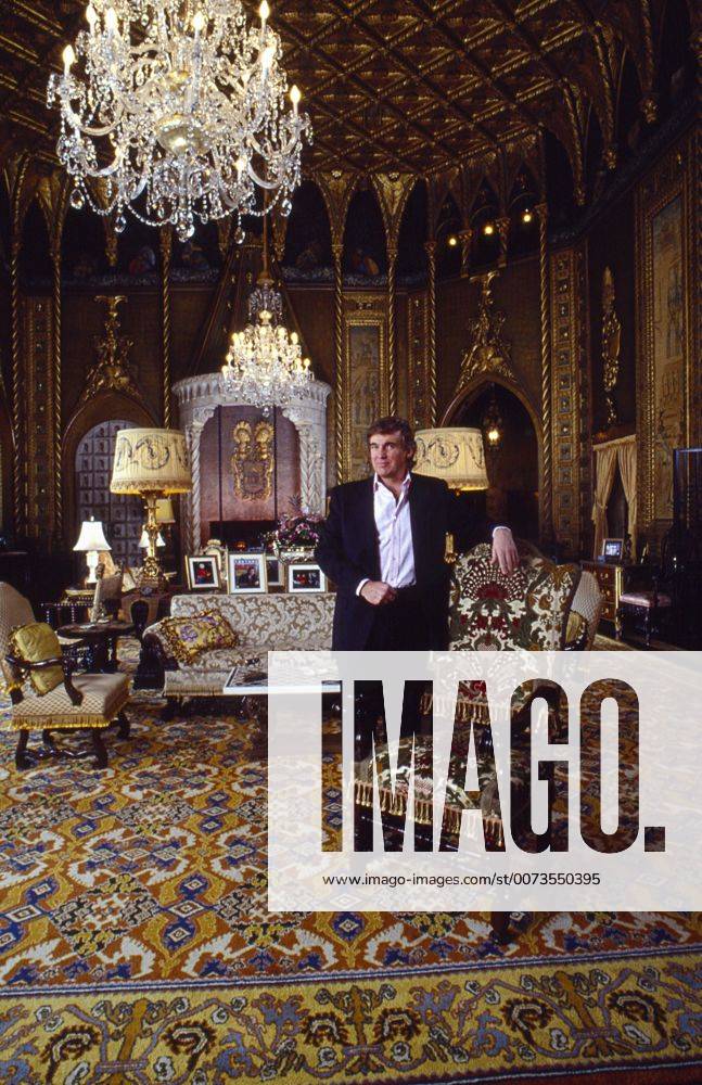 Nov 1, 1992 - Palm Beach, Florida, U.S. - EXCLUSIVE - DONALD TRUMP standing a chair in the living room of Mar-a-lago in Palm Beach. Palm Beach U.S. - ZUMAd135