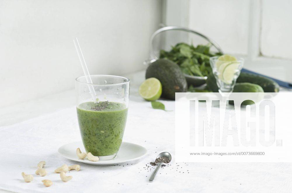 Green smoothie, ingredients chia seeds, cashews, spinach, cucumber, avocado and lime ASF005983