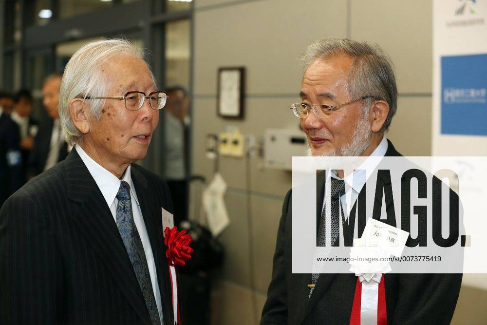 Yokohama, Japan - Tokyo Institute of Technology president professor Yoshinori Ohsumi (R) chats with 2000 Nobel Prize laureate Hideki Shirakawa during a reception at the Suzukakedai campus of Tokyo Institute of Technology in Yokohama, suburban Tokyo on Friday, October 7, 2016. Ohsumi received the Nobel Prize in Physiology or Medicine 2016. (lwxa005258)