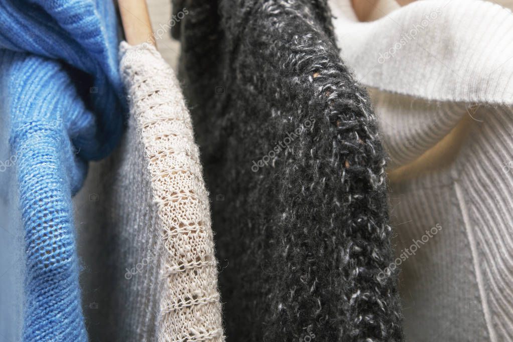 Warm clothes hang on a hanger