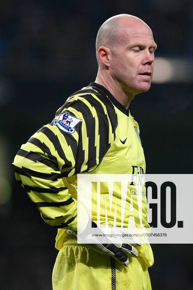 Football - FA Cup Fifth Round - Manchester City (blue) vs. Aston Villa (black): Brad Friedel of Aston Villa looks dejected at the City of Manchester Stadium