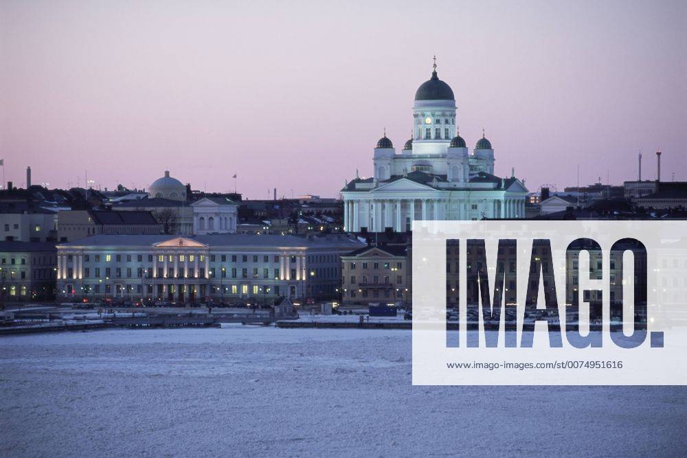 Dusk light on the Lutheran Christian cathedral in winter snow, across the frozen Baltic Sea, Helsinki, Finland, Scandinavia, Europe
