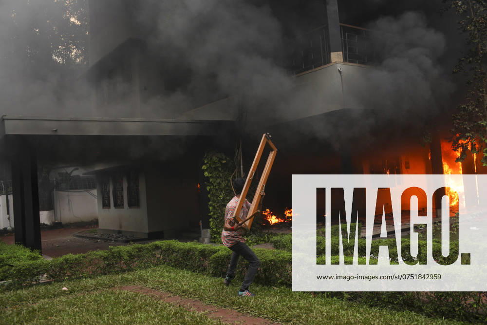 The Bangabandhu Memorial Museum is set on fire by anti-government protestors in Dhaka on August 5, 2024. Protests in Bangladesh that began as student-led demonstrations against government hiring rules in July culminated on August 5, in the prime minister fleeing and the military announcing it would form an interim government. Dhaka Bangladesh - ZUMAj163 20240805_zip_j163_031