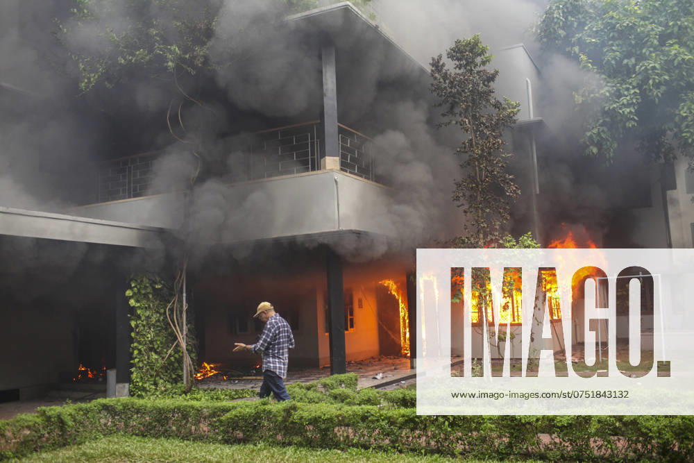 The Bangabandhu Memorial Museum is set on fire by anti-government protestors in Dhaka on August 5, 2024. Protests in Bangladesh that began as student-led demonstrations against government hiring rules in July culminated on August 5, in the prime minister fleeing and the military announcing it would form an interim government. Dhaka Bangladesh - ZUMAj163 20240805_zip_j163_029