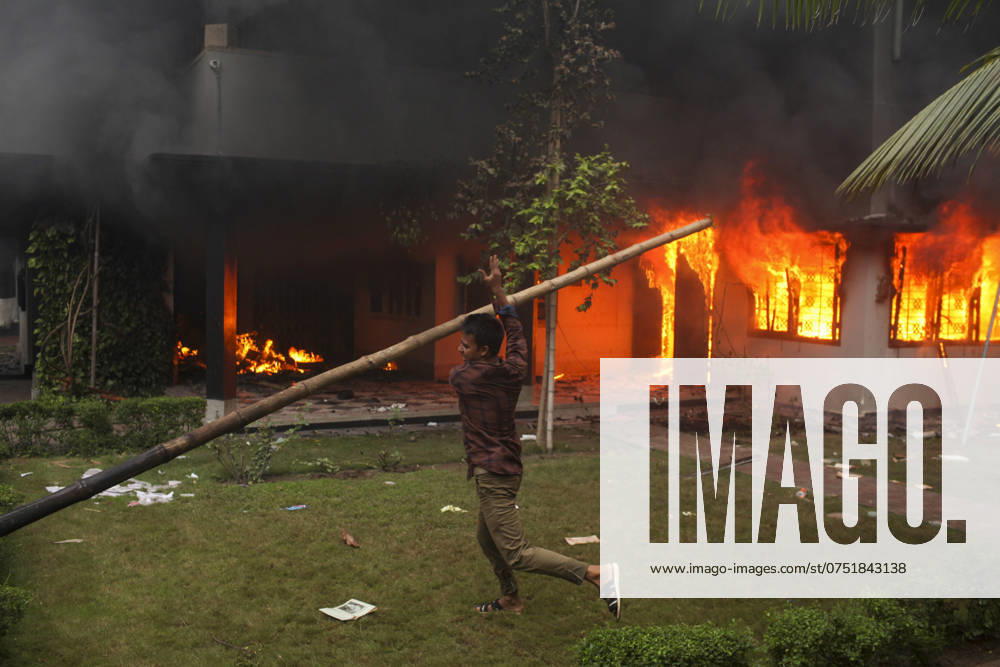 The Bangabandhu Memorial Museum is set on fire by anti-government protestors in Dhaka on August 5, 2024. Protests in Bangladesh that began as student-led demonstrations against government hiring rules in July culminated on August 5, in the prime minister fleeing and the military announcing it would form an interim government. Dhaka Bangladesh - ZUMAj163 20240805_zip_j163_032