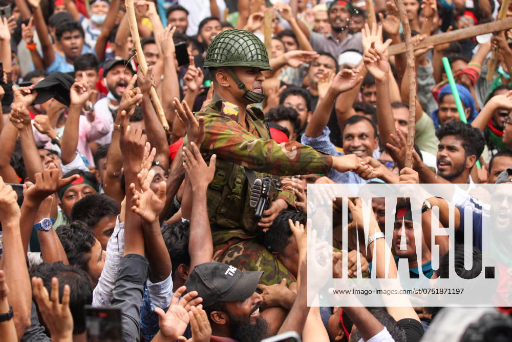 Anti-government Protest in Bangladesh Anti-government protestors celebrate in Dhaka on August 5, 2024. Protests in Bangladesh that began as student-led demonstrations against government hiring rules in July culminated on August 5, in the prime minister fleeing and the military announcing it would form an interim government. Dhaka Dhaka Bangladesh