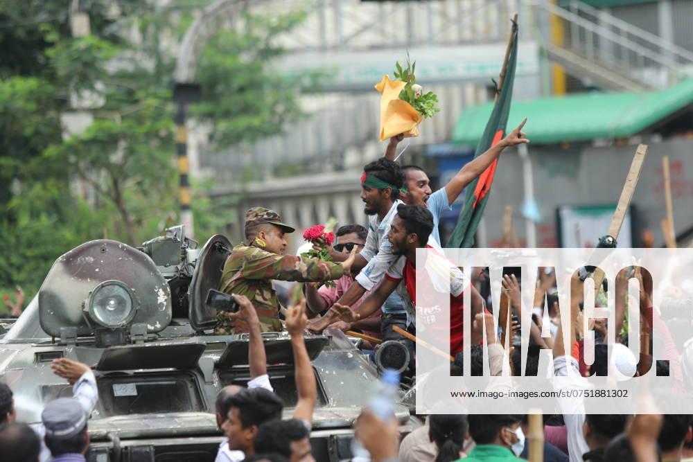 Anti-government protestors celebrate in Shahbag near Dhaka university area in Dhaka on August 5, 2024. Protests in Bangladesh that began as student-led demonstrations against government hiring rules in July culminated on August 5, in the prime minister fleeing and the military announcing it would form an interim government.People gather to celebrate the fall of Bangladesh Prime Minister Sheikh Hasina after an intense clash between police, pro-government forces, and anti-Quota protesters in Dhaka, Bangladesh. Dhaka Bangladesh - ZUMAr336 20240805_zip_r336_057