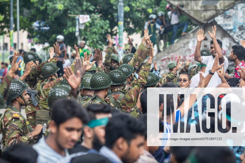 Anti-government protestors celebrate with army personnel in Shahbag near Dhaka University area. Thousands of people are celebrating the resignation of Bangladeshi Prime Minister Sheikh Hasina..Protests in Bangladesh that began as student-led demonstrations against government hiring rules in July culminated on August 5, in the prime minister fleeing and the military announcing it would form an interim government. Dhaka Bangladesh - ZUMAs197 20240805_aaa_s197_080