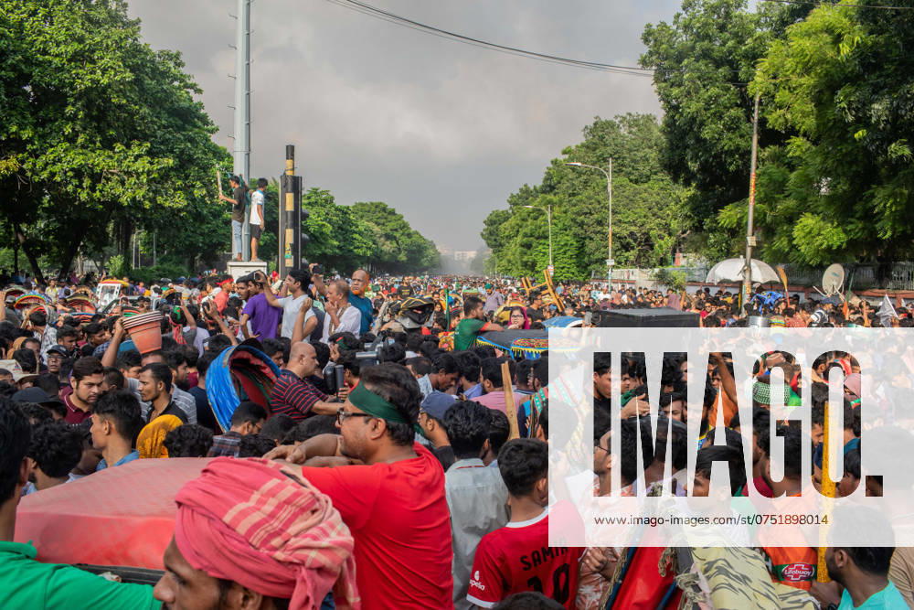 Anti-government protestors march on the street during the celebrations. Thousands of People celebrate the resignation of Bangladeshi Prime Minister Sheikh Hasina..Protests in Bangladesh that began as student-led demonstrations against government hiring rules in July culminated on August 5, in the prime minister fleeing and the military announcing it would form an interim government. Dhaka Bangladesh - ZUMAs197 20240805_aaa_s197_090