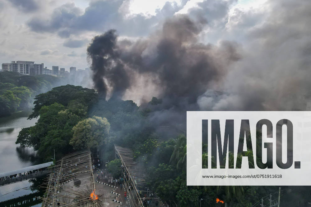 Thousands of People celebrate in Dhaka - 05 Aug 2024 (EDITORS NOTE: Image taken with drone) Anti-government protestors set ablaze the entrance area of Bangabandhu Memorial Museum in Dhaka during the celebrations. Thousands of people are celebrating the resignation of Bangladeshi Prime Minister Sheikh Hasina. Protests in Bangladesh that began as student-led demonstrations against government hiring rules in July culminated on August 5, with the Prime Minister fleeing and the military announcing it would form an interim government. Dhaka Bangladesh