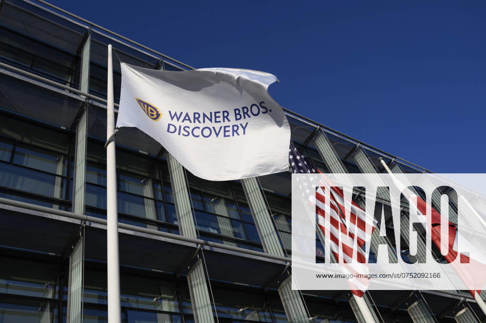 Warner Bros Discovery A Warner Bros (Discovery) flag is fluttering outside the TVN broadcaster headquarters in Warsaw, Poland, on August 6, 2024. Warner Bros Discovery is looking to offload smaller assets in a bid to avoid a breakup of the company. Warsaw Poland