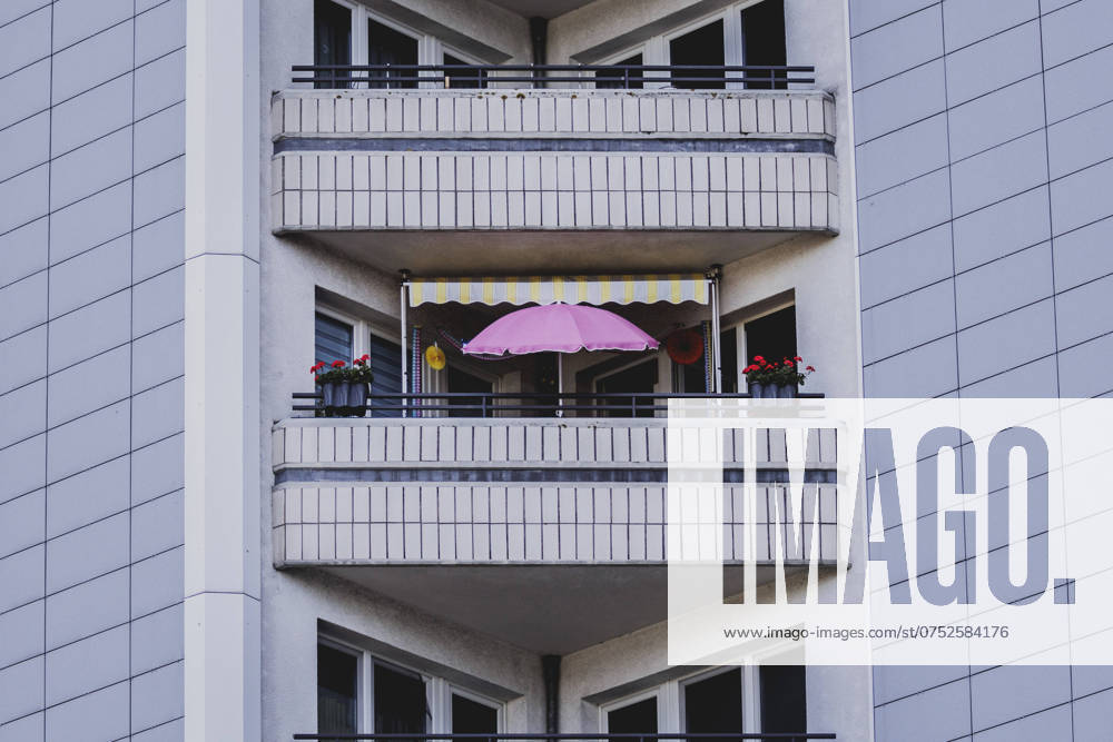 Parasol on the balcony of a prefabricated building, taken in Berlin, 07 08 2024 Berlin Germany