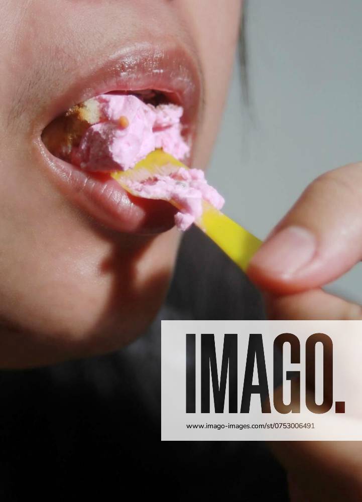 Woman eating cup cake deliciously,, Woman eating cup cake deliciously, Soft blurred background, Woman eating cup cake deliciously, Soft blurred background, 29.12.2023,