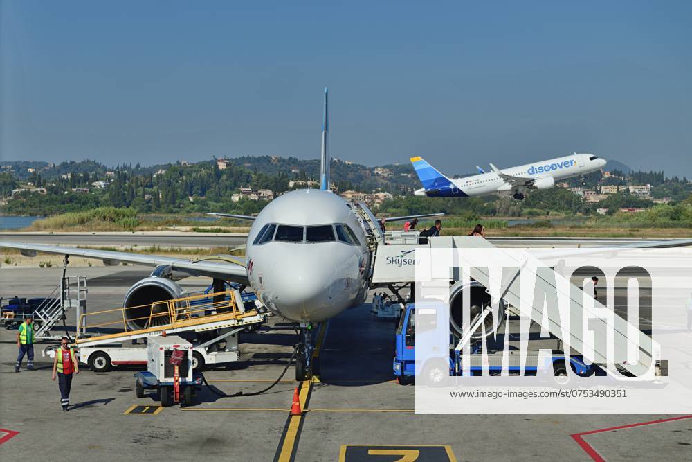 Air traffic in Corfu Air traffic at the Fraport-operated international airport on the vacation island of Corfu A Eurowings aircraft is handled, behind it a Discover Jet takes off Corfu Airport Corfu Greece