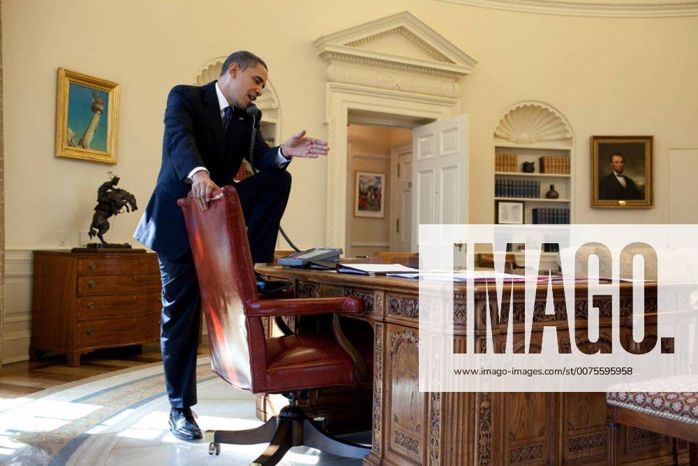 Mar. 24, 2010 - Washington, DC, USA - President Barack Obama calls a Member of Congress to discuss health care reform in the Oval Office, March 19, 2010.Ãä Barack Hussein Obama II (born August 4, 1961) is the 44th President of the United States. He is the first African American to be elected to office and the first president born outside the contiguous United States. Born in Honolulu, Hawaii, Obama is a graduate of Columbia University and Harvard Law School. He worked as a civil rights attorney and taught constitutional law at the University of Chicago Law School from 1992 to 2004. While serving three terms representing the 13th District in the Illinois Senate from 1997 to 2004, he ran unsuccessfully in the Democratic primary for the United States House of Representatives in 2000. Washington USA - ZUMAz03_ 20100324_shh_z03_787