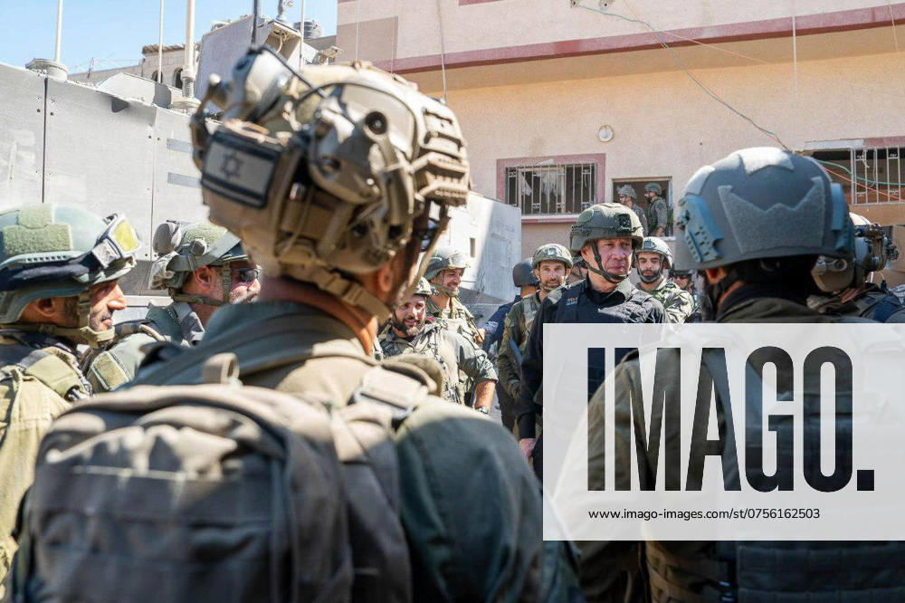 Rafah, Gaza Strip: Israeli Minister of Defense YOAV GALLANT (in black) visits troops from the IDFâ€⠢s Division 162, deployed to the Rafah area and the Philadelphi route. Gallant held an operational situation assessment with senior IDF officials, was briefed on the operational activity and instructed the forces to concentrate efforts on completing the destruction of remaining Hamas tunnels. Rafah Gaza Strip - ZUMAi99_ 20240821_zip_i99_005