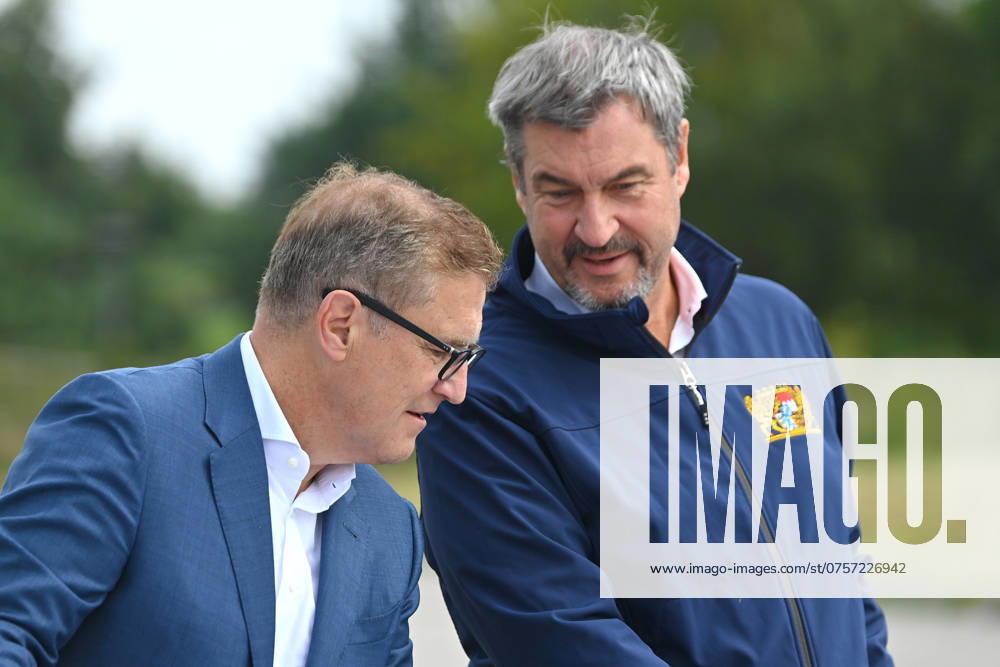 From left Jan Christian DREESEN Chairman of the Board FCB , Markus SOEDER State Premier of Bavaria and CSU Chairman , Starting signal for the construction of an electric charging park for commercial vehicles at the Allianz Arena Cooperation project of FC Bayern Munich with MAN Truck and Bus on 27 08 2024