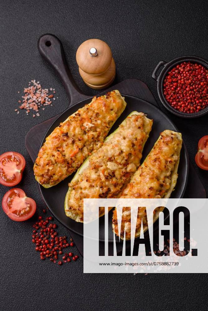 Zucchini halves baked with cheese, tomatoes, meat or meat substitute, Zucchini halves baked with cheese, tomatoes, meat or meat substitute with salt, spices and herbs, Zucchini halves baked with cheese, tomatoes, meat or meat substitute with salt, spices and herbs, 08.07.2024,