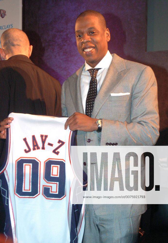 Jan 18, 2007; Brooklyn, NY, USA; JAY-Z, whose real name is SHAWN CARTER, part owner of the NJ Nets holds up a Nets jersey as Barclays, a global financial services company, and the Nets, of the National Basketball Association, announce a multi-faceted marketing partnership that includes the 20-year naming rights to the Barclays Center, the planned centerpiece of the Atlantic Yards development in Brooklyn at the Brooklyn Museum of Art in Brooklyn. Mandatory - ZUMAb09_ 20070118_bry_b09_387