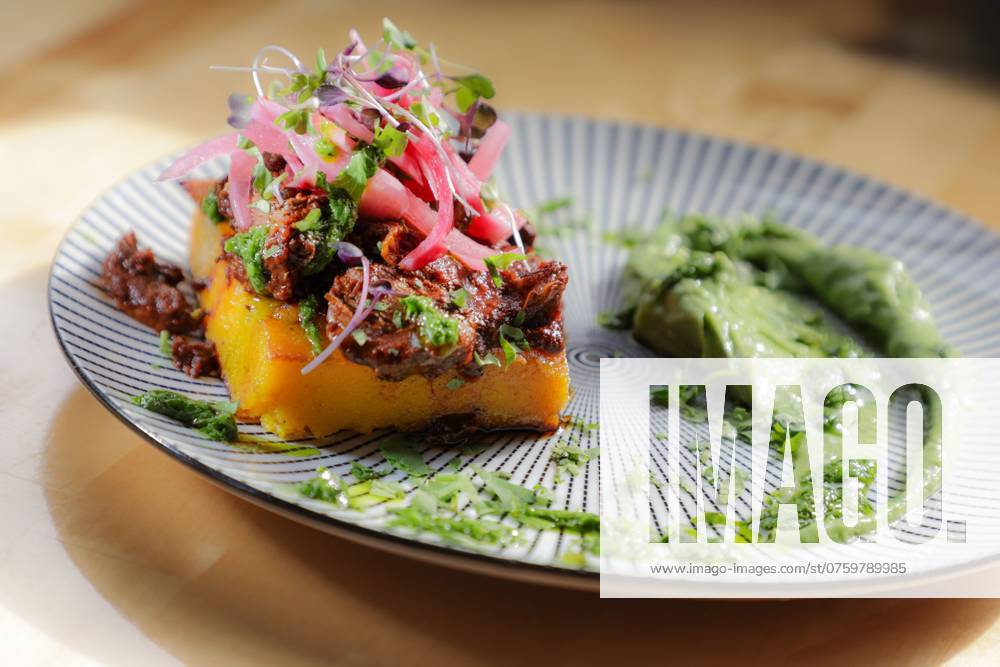 IMAGO Creative, Food, Pickled Onions September 6, 2024, St. Petersburg, Florida, USA: Lamb Barbacoa, made with cumin spiced cornmeal-sweet potato cake, pickled red onion, and avocado-serrano chile sauce ($17), is available on Friday, Sep 6, 2024, at Lolitaâ€⠢s Wine Market, 420 22nd St S, in St. Petersburg. St. Petersburg USA - ZUMAs70_ 20240906_zan_s70_025