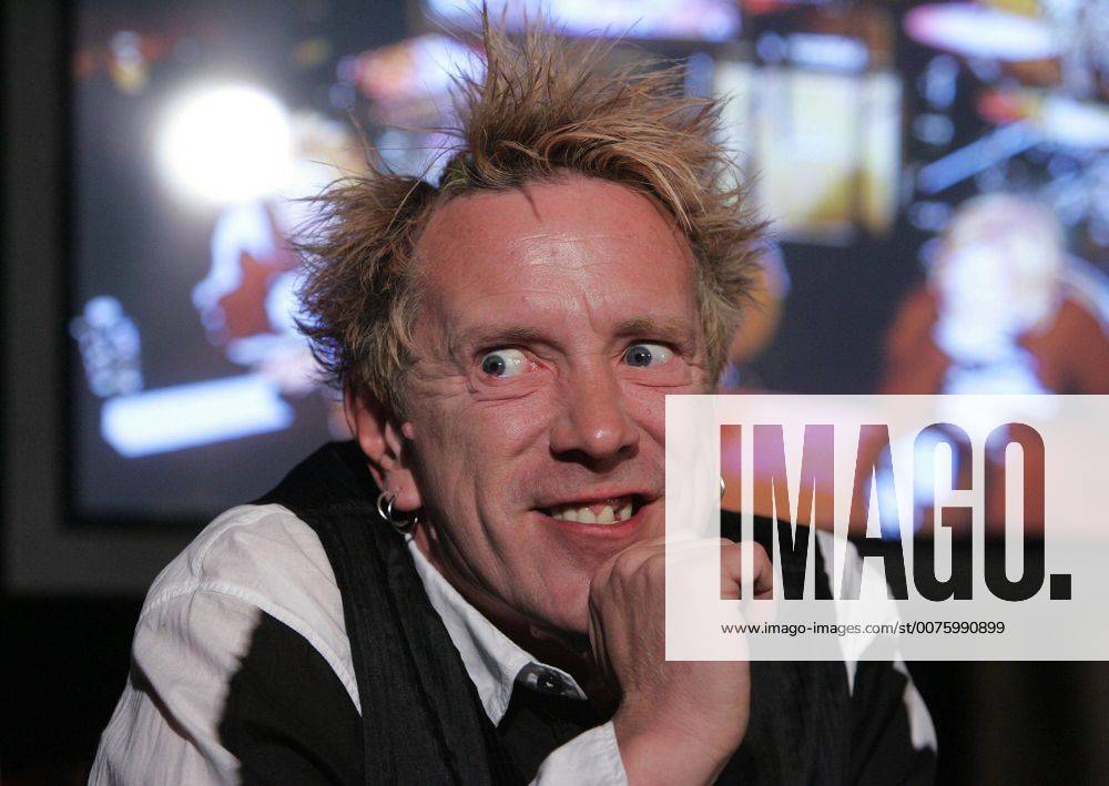 Mar 09, 2007 - Toronto, ON, CANADA - An extremely animated JOHN LYDON, the former Johnny Rotten listens to a question at a press conference along with Bif Naked and the Cult s Billy Duffy at a press conference to announce the Canadian version of contest known as the Bodog Battle of the Bands inwhich the three are judges. March 9, 2007. - ZUMA 20070309_kri_t14_067