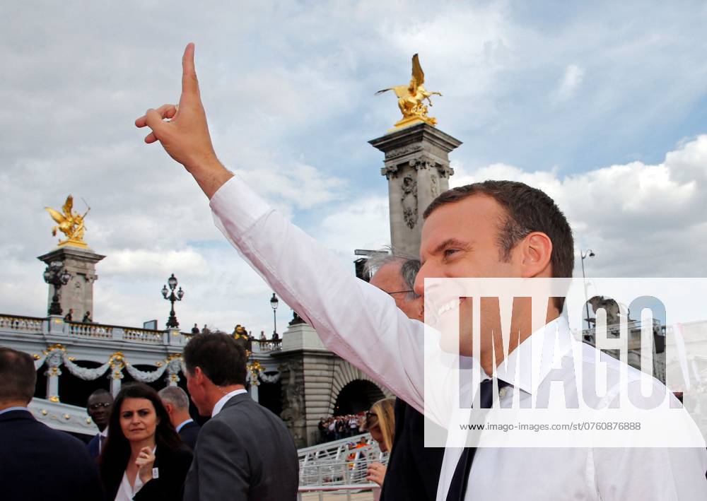 French President Emmanuel Macron waves to the crowd in Paris French President Emmanuel Macron waves to the crowd in Paris, France, June 24, 2017. The French capital is transformed into a giant Olympic park to celebrate International Olympic Days with a variety of sporting events for the public across the city during two days as the city bids to host the 2024 Olympic and Paralympic Games.REUTERS Jean-Paul Pelissier PHOTO NEWS ! only BELGIUM ! PARIS France
