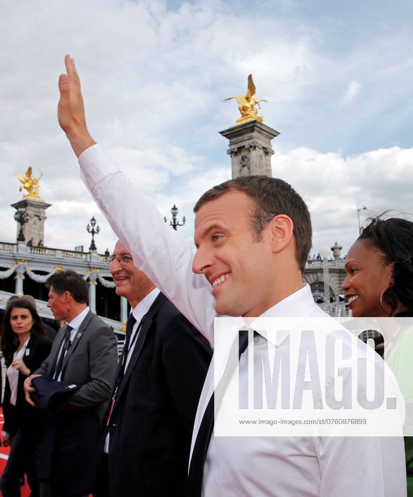 French President Emmanuel Macron waves to the crowd in Paris French President Emmanuel Macron waves to the crowd in Paris, France, June 24, 2017. The French capital is transformed into a giant Olympic park to celebrate International Olympic Days with a variety of sporting events for the public across the city during two days as the city bids to host the 2024 Olympic and Paralympic Games.REUTERS Jean-Paul Pelissier PHOTO NEWS ! only BELGIUM ! PARIS France
