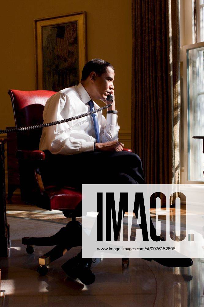 Feb. 02, 2009 - Washington, District of Columbia, U.S. - President BARACK OBAMA speaks with the Iraqi Prime Minister on the phone in the Oval Office at the White House. Washington U.S. - ZUMAjlr_ 20090202_617_z03_006