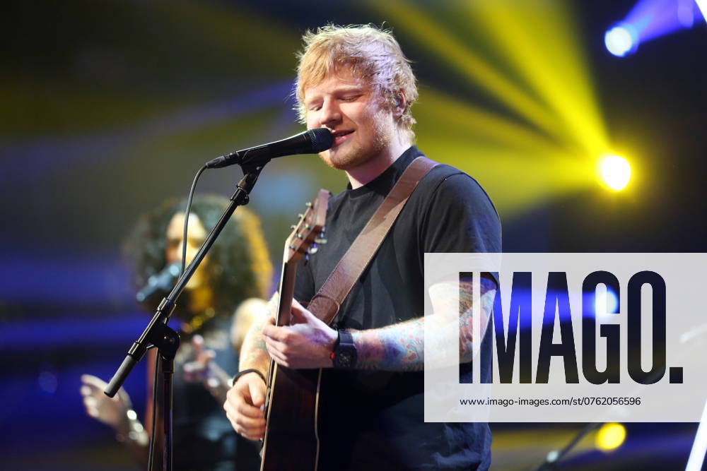 Ed Sheeran Live in Copenhagen. Photo. Ed Sheeran Edward Christopher Ed Sheeran (born 17 February 1991) is an English singer-songwriter and guitarist. He also writes and produces songs on his own and created his label, Paw Print Records. 2 Sheeran is recognized for doing pop music. He was born in Halifax, West Yorkshire. As a child, he lived in Framlingham, Suffolk. Sheeran is set to release his third studio album, ˜ ( divide ), on 3 March 2017. He released the two singles Shape of You and Castle on the Hill in January 2017. Shape of You became his first number-one hit on the Billboard Hot 100 when it entered at the top of the chart. The song has reached number one in several countries around the world, and Castle on the Hill