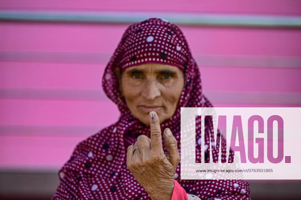 First Phase Of Assembly Elections Begins In Kashmir After 10 Years A woman shows her ink-marked finger after casting her ballot at a polling station during the first phase of assembly elections in Kulgam, south of Srinagar, Jammu and Kashmir, on September 18, 2024. The first phase of the three-phase Jammu and Kashmir Legislative Assembly polls takes place in the south Kashmir and Chenab Valley regions of Indian Kashmir. These are the first elections for the J&K Legislative Assembly in 10 years. Indian Kashmir has been without the Legislative Assembly since the Government of India abrogated Article 370 of its constitution, ending its semi-autonomous character. The elections take place under high security arrangements, and Prime Minister of I