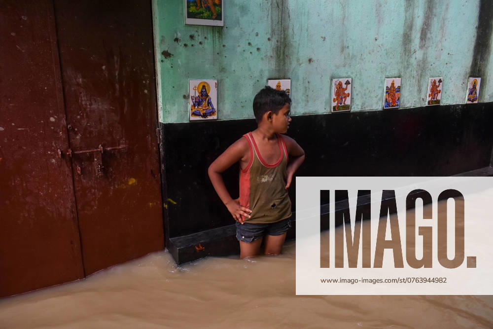 Flood In West Bengal. A boy stands amidst a flooded road in Kolkata, India, on September 21, 2024. Many regions of Kolkata experience flash floods during high tide over the River Ganges, coupled with the alleged release of water from the Damodar Valley Corporation dam, which reaches capacity due to heavy rain last week, according to reports. Kolkata India