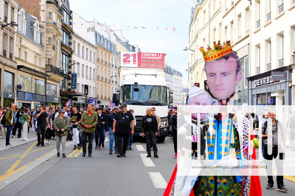 KW38 Anti-Government Protest In Paris, France Michel Barnier and Emmanuel Macron caricature during a protest against the Macron-Barnier government, in Paris, on September 21, 2024. France s new premier said he hoped to finalise a long-awaited government before September 22, 2024 , as President Emmanuel Macron weighed a line-up that marks a shift to the right, with left-wingers due to protest on September 21, 2024. Paris France