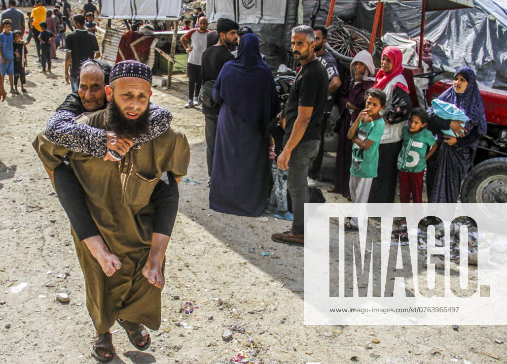 Palestinian-Israel conflict in the Gaza Strip Targeting a civilian house next to a school complex that is used as shelters, which caused fear and panic among the displaced people in these schools in Jabalia camp, north of the Gaza Strip. The Gaza Strip Palestine