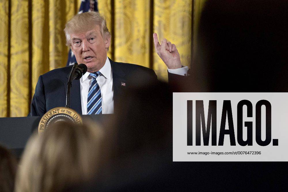 U.S. President Donald Trump speaks during a swearing in of White House senior staff in the East Room of the White House in Washington, D.C on January 22, 2017. Pool photo by Andrew Harrer WAX20170122901