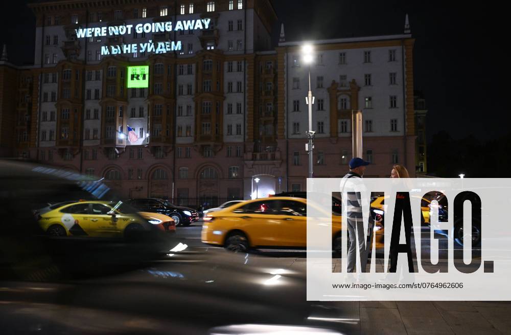 KW39 Russia US Media Sanctions 8773441 26.09.2024 A light projection reading RT. Were not going away is seen on the facade of the U.S. embassy in Moscow, Russia. Earlier in September, the United States imposed sanctions on Russia?s media group Rossiya Segodnya and RT broadcaster for their alleged disinformation campaigns on behalf of Moscow. Alexey Maishev Sputnik Moscow Russia