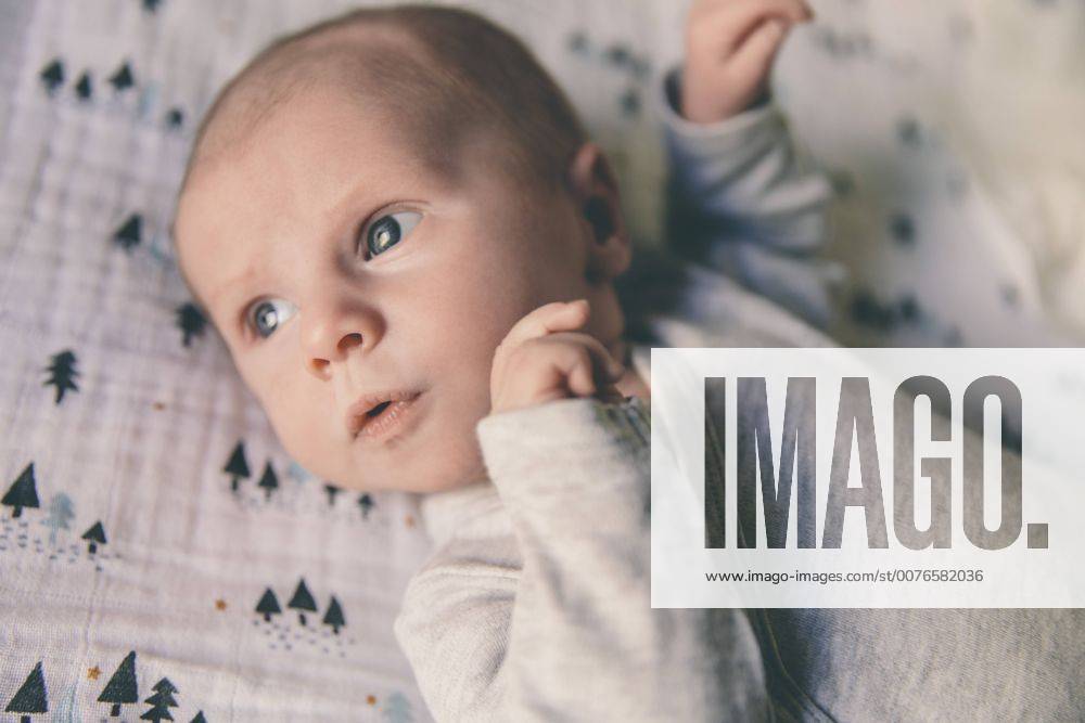 Close-up of newborn baby wearing romper model released Symbolfoto MFF03448