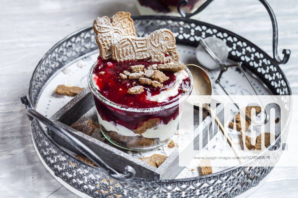Glass of dessert of almond biscuits, Greek yoghurt and cranberry compote SBDF03120