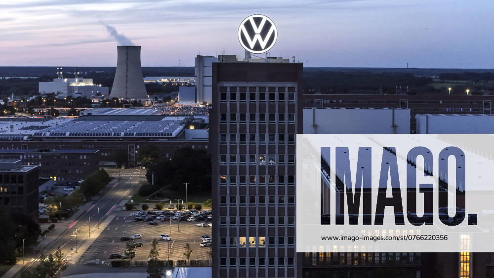 Volkswagen VW logo on the brand tower at Group headquarters in Wolfsburg, 29 09 2024 The Volkswagen Group has announced cost-cutting measures for its German plants Wolfsburg Lower Saxony Germany