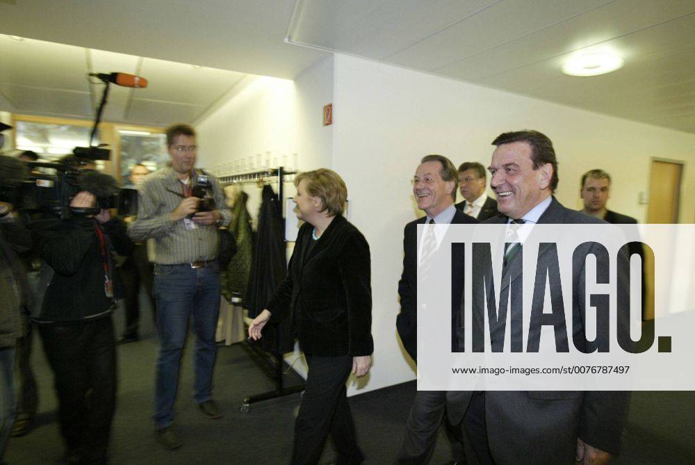Oct 24, 2005 - Berlin, GERMANY - After the inconclusive result of the 2005 German federal election, neither of the traditional coalitions could form a majority government and so the formation of a new government required careful negotiations. Finally, on October 10, officials from the CDU CSU and the SPD announced that negotiations had concluded successfully on forming a Grand Coalition with Angela Merkel as a Chancellor. Detailed negotiations on the formation of the new government continued into November. PICTURED: Designated Chancellor and CDU CSU Chairwoman ANGELA MERKEL, SPD Chairman FRANZ MUENTEFERING and Chancellor GERHARD SCHROEDER. - ZUMAkg1_ 20051024_olc_k98_808