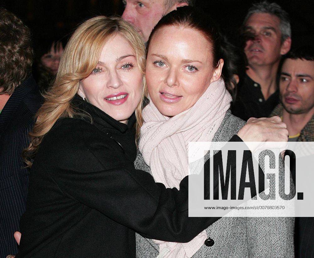 Nov 28, 2005; London, UK; Singer MADONNA and friend designer STELLA MCCARTNEY watch the switching of the Christmas lights decorating Stella McCartney s Bruton Street shop in London.. - ZUMAmcca 20051128_dom_d33_001