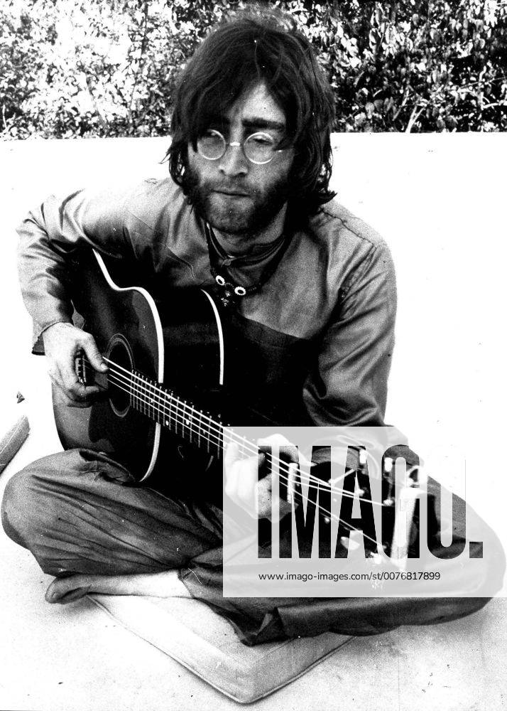 John Winston Ono Lennon, MBE, born October 9, 1940, murdered December 8, 1980, was an English songwriter, singer, musician, graphic artist, author and peace activist who gained worldwide fame as one of the founders of The Beatles. PICTURED: (File Photo: Date Unknown) Himalaya, Tibet, China - Actor Composer Director JOHN LENNON (1940-1980) with his guitar at the meditation academy in the Himalayas. - ZUMAz05_ 20051208_sim_z05_462