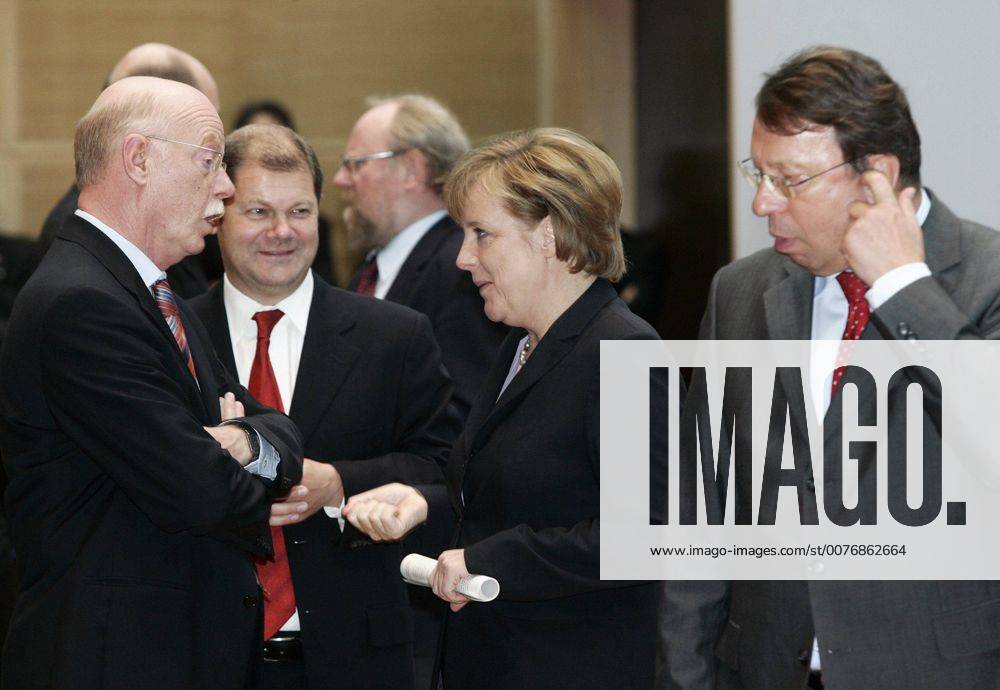Oct 27, 2005 - Berlin, GERMANY - After the inconclusive result of the 2005 German federal election, neither of the traditional coalitions could form a majority government and so the formation of a new government required careful negotiations. Finally, on October 10, officials from the CDU CSU and the SPD announced that negotiations had concluded successfully on forming a Grand Coalition with Angela Merkel as a Chancellor. Detailed negotiations on the formation of the new government continued into November. PICTURED: Minister of Defence PETER STRUCK, SPD politician OLAF SCHOLZ, Designated Chancellor and CDU CSU Chairwoman ANGELA MERKEL and Secretary General of SPD KLAUS UWE BENNETER. - ZUMAkg1_ 20051027_olc_k98_826