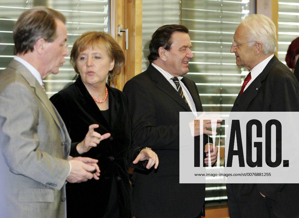 Nov 10, 2005 - Berlin, GERMANY - After the inconclusive result of the 2005 German federal election, neither of the traditional coalitions could form a majority government and so the formation of a new government required careful negotiations. Finally, on October 10, officials from the CDU CSU and the SPD announced that negotiations had concluded successfully on forming a Grand Coalition with Angela Merkel as a Chancellor. Detailed negotiations on the formation of the new government continued into November. PICTURED: SPD Chairman FRANZ MUENTEFERING, Designated Chancellor and CDU CSU Chairwoman ANGELA MERKEL, Chancellor GERHARD SCHROEDER and CSU Chairman EDMUND STOIBER. - ZUMAkg1_ 20051110_olc_k98_814