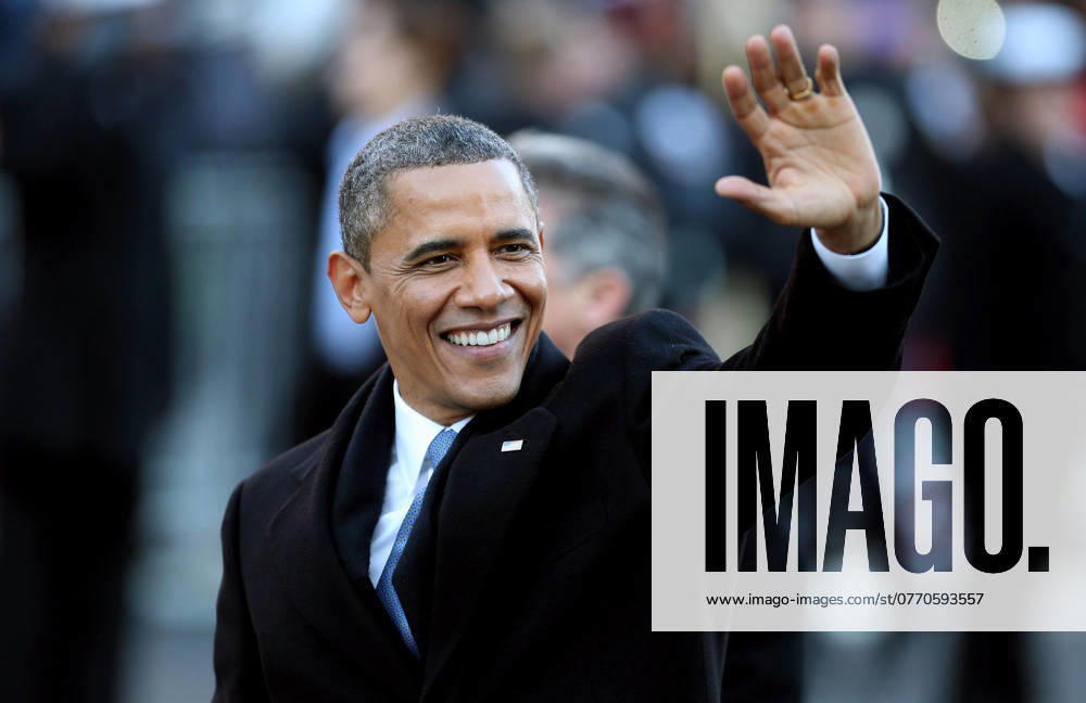 2013 Inaugural Parade 21 January, 2013 - Washington, D.C. - United States President Barack Obama and First lady Michelle Obama wave as the presidential inaugural parade winds through the nation s capital. Photo Credit: Chip Somodevilla CNP AdMedia Washington District of Columbia United States of America