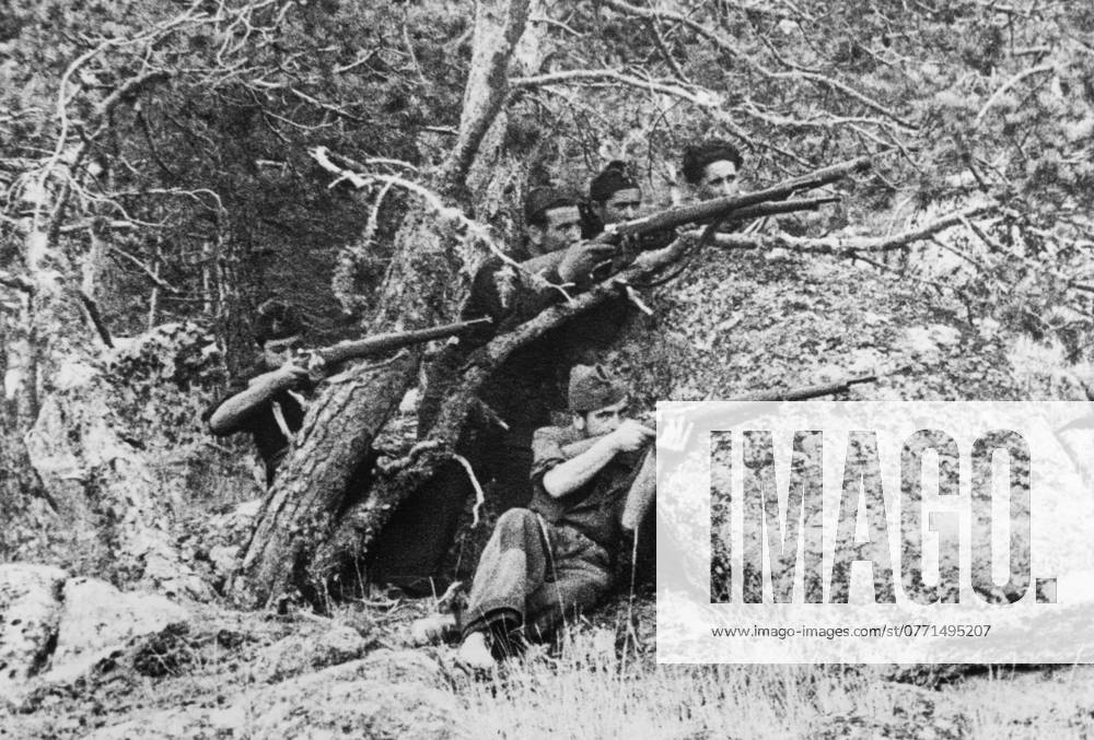 Orig caption THE CIVIL WAR AROUND MADRID N P M A group of militia fired a shot in the Peguerinos area they drove off troops commanded by Fernando de Rosas, a socialist militant Note Government Troops Sight Rifle CD421 sites SPAIN sp sw